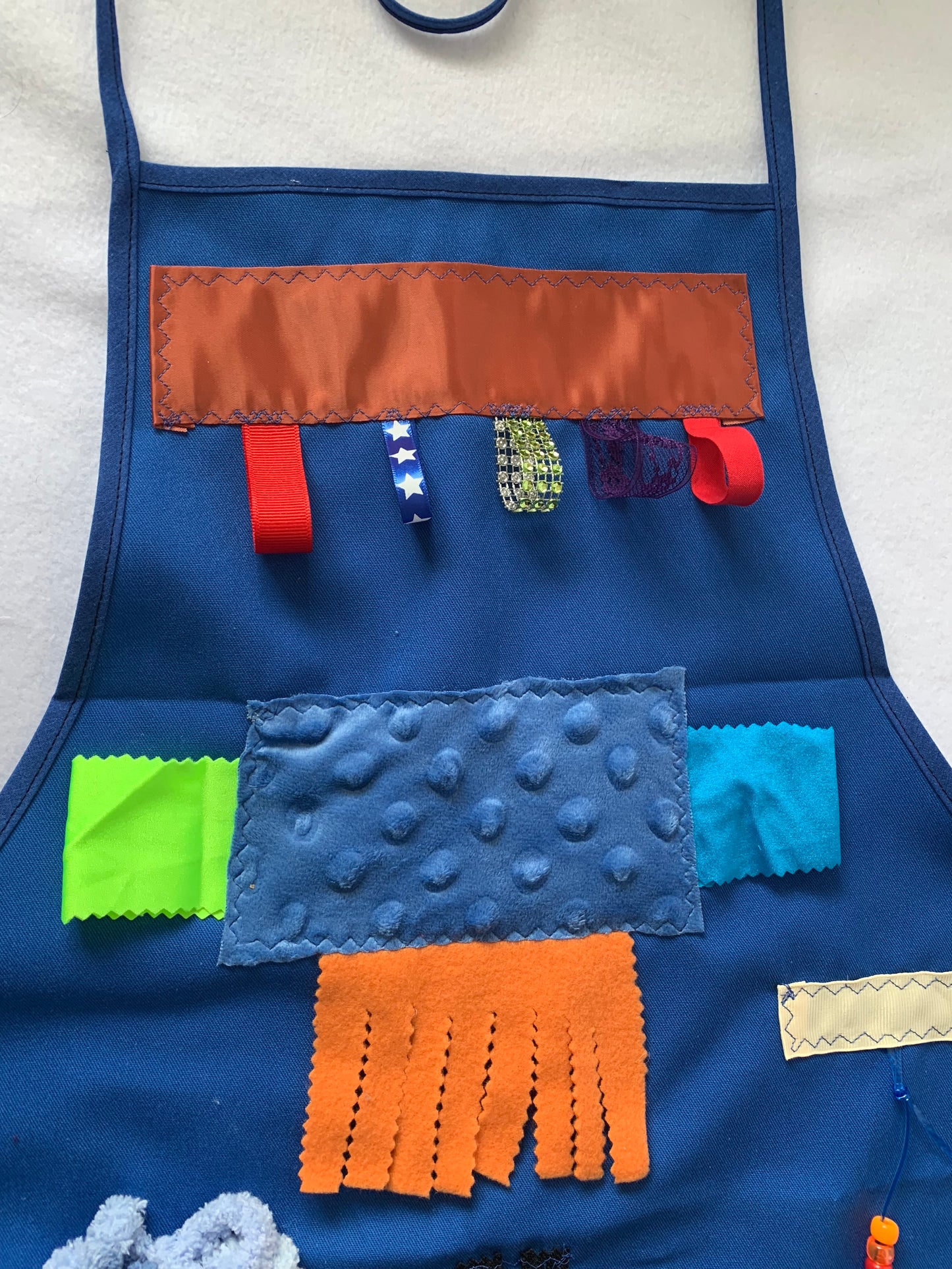 Adult Fidget Apron, tactile apron, various fidgets and ribbons, zipper, washable