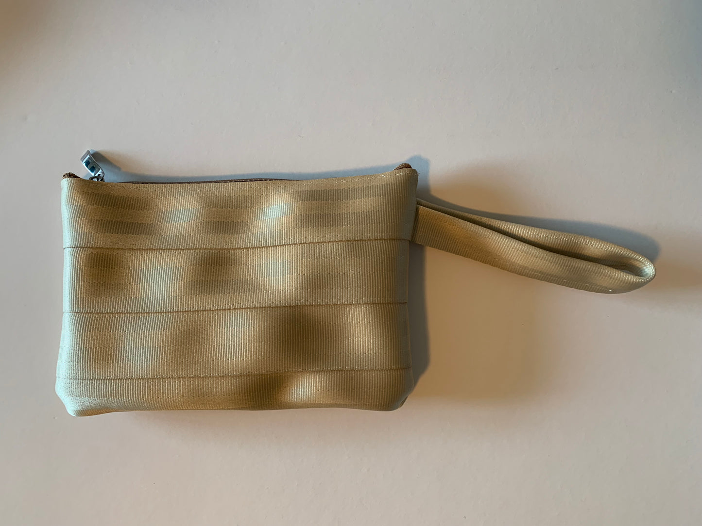 Seat belt clutch with wrist strap, various colors, lined or unlined, make up bag