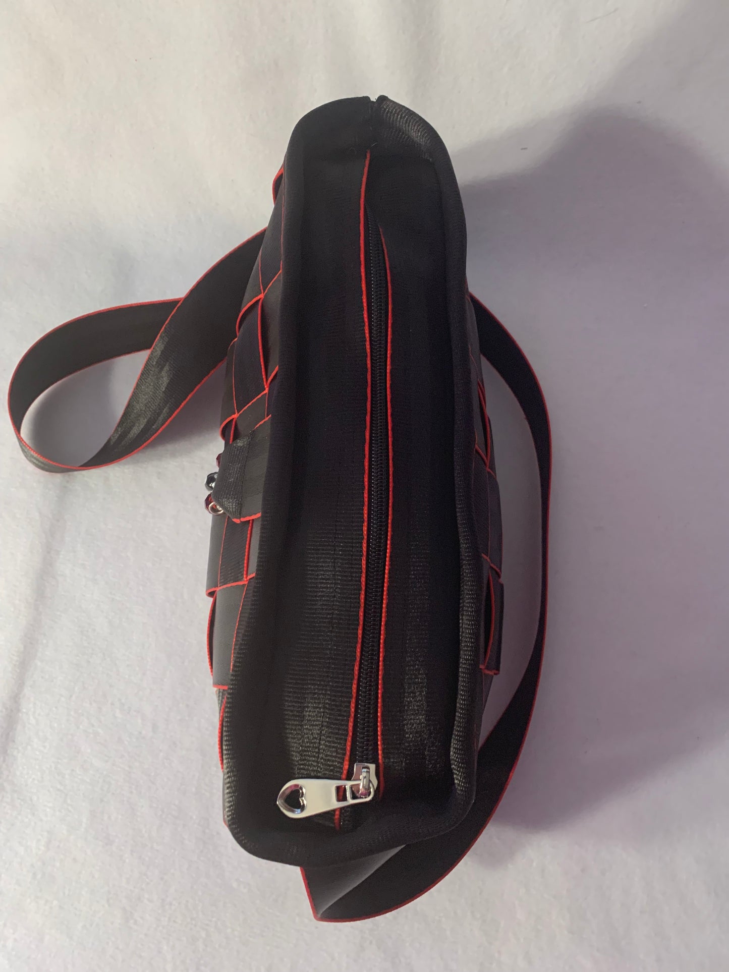 Cross Body Seat Belt Purse in black with red edges, zipper and flap, washable, various linins available