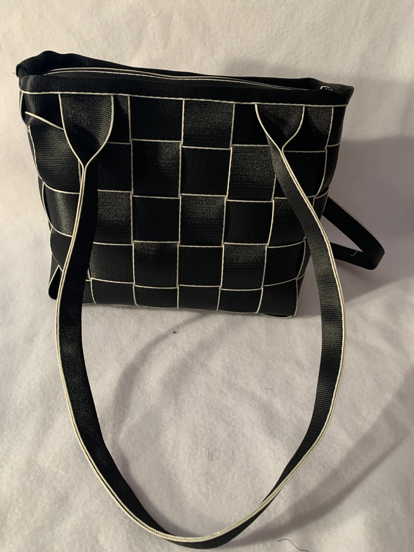 Seat Belt Purse in black with white edges, zipper, washable, geometric lining, large satchel, shoulder straps