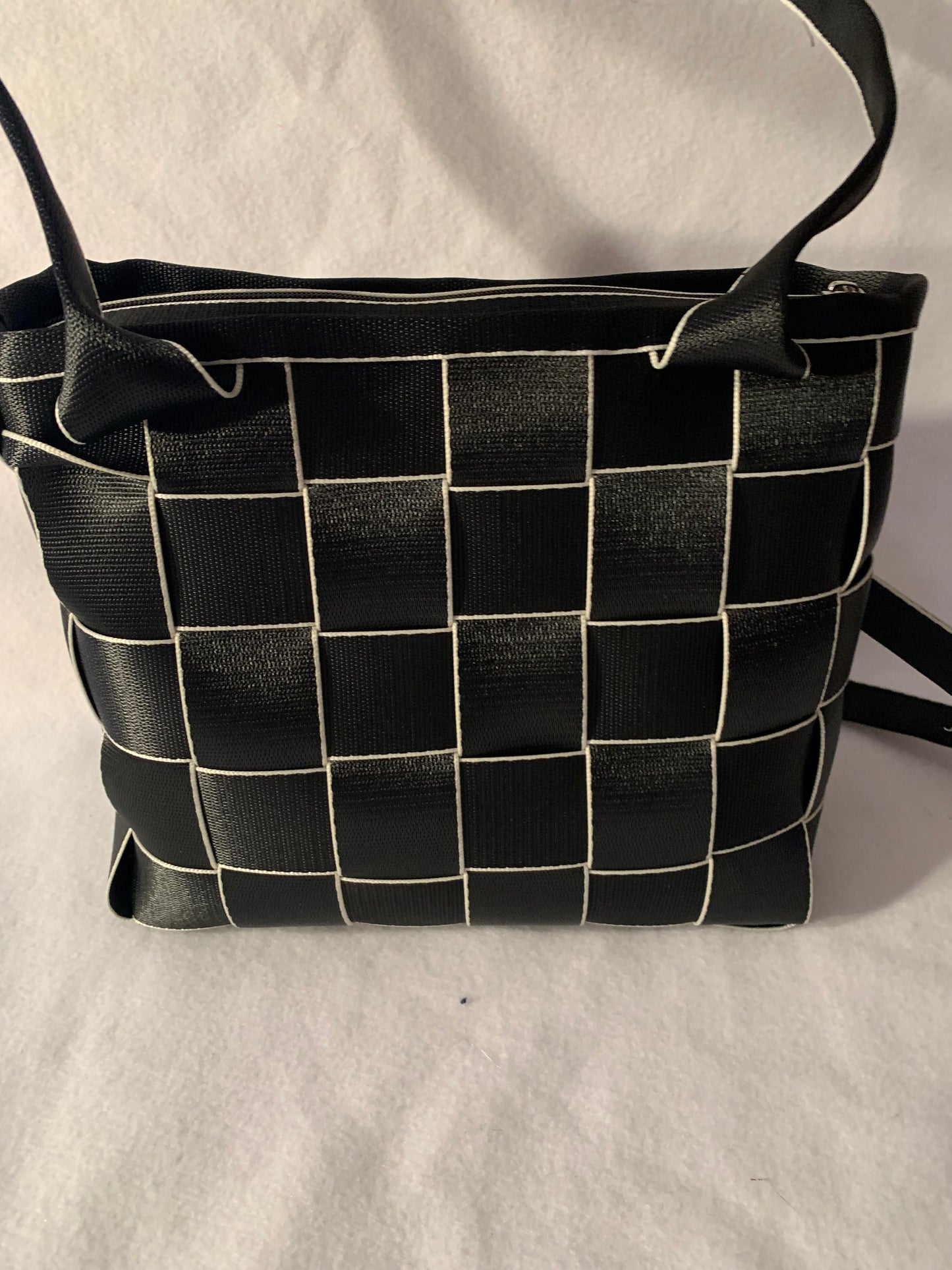 Seat Belt Purse in black with white edges, zipper, washable, geometric lining, large satchel, shoulder straps