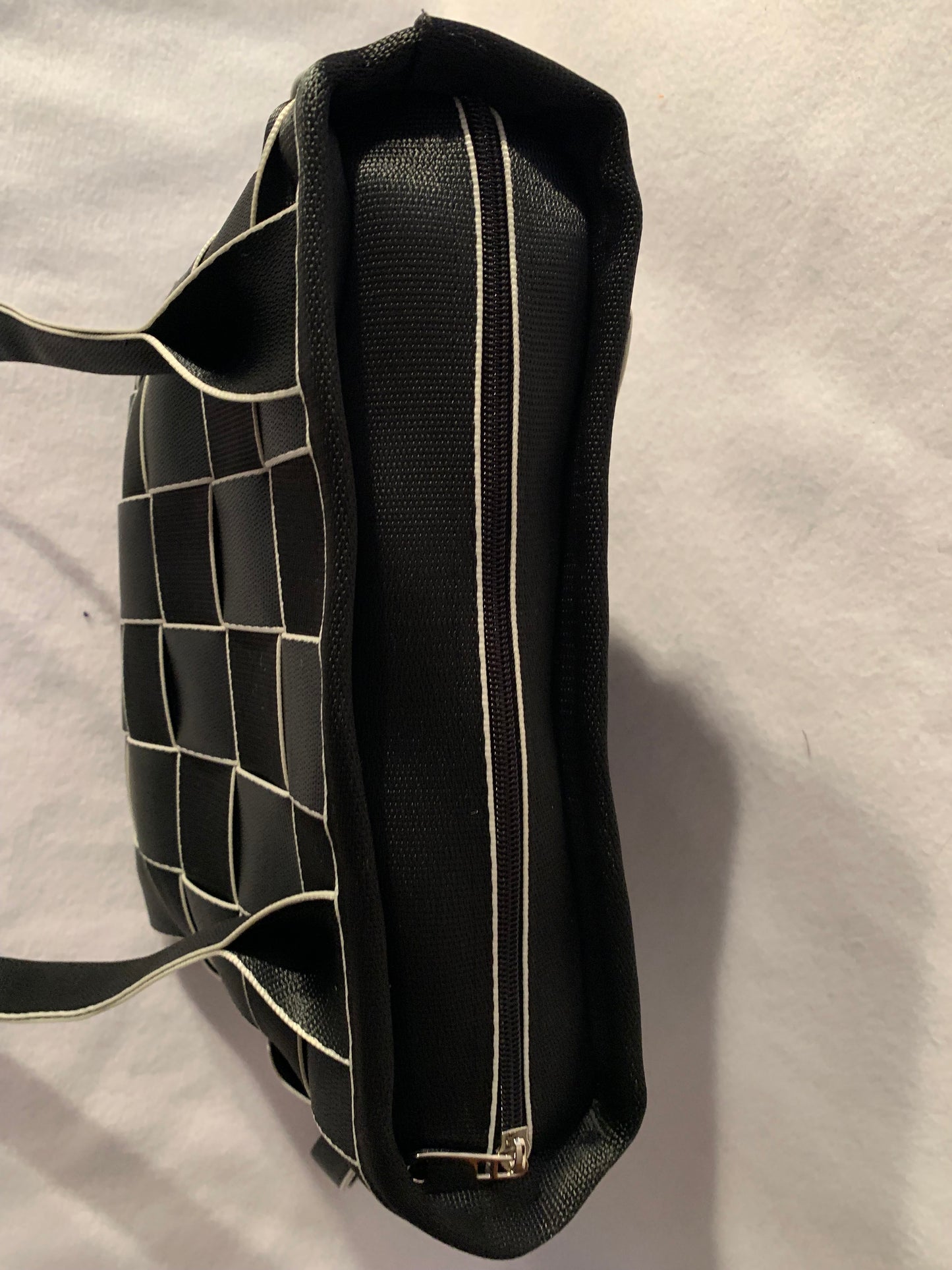 Seat Belt Purse in black with white edges, zipper, washable, geometric lining, large satchel, shoulder straps