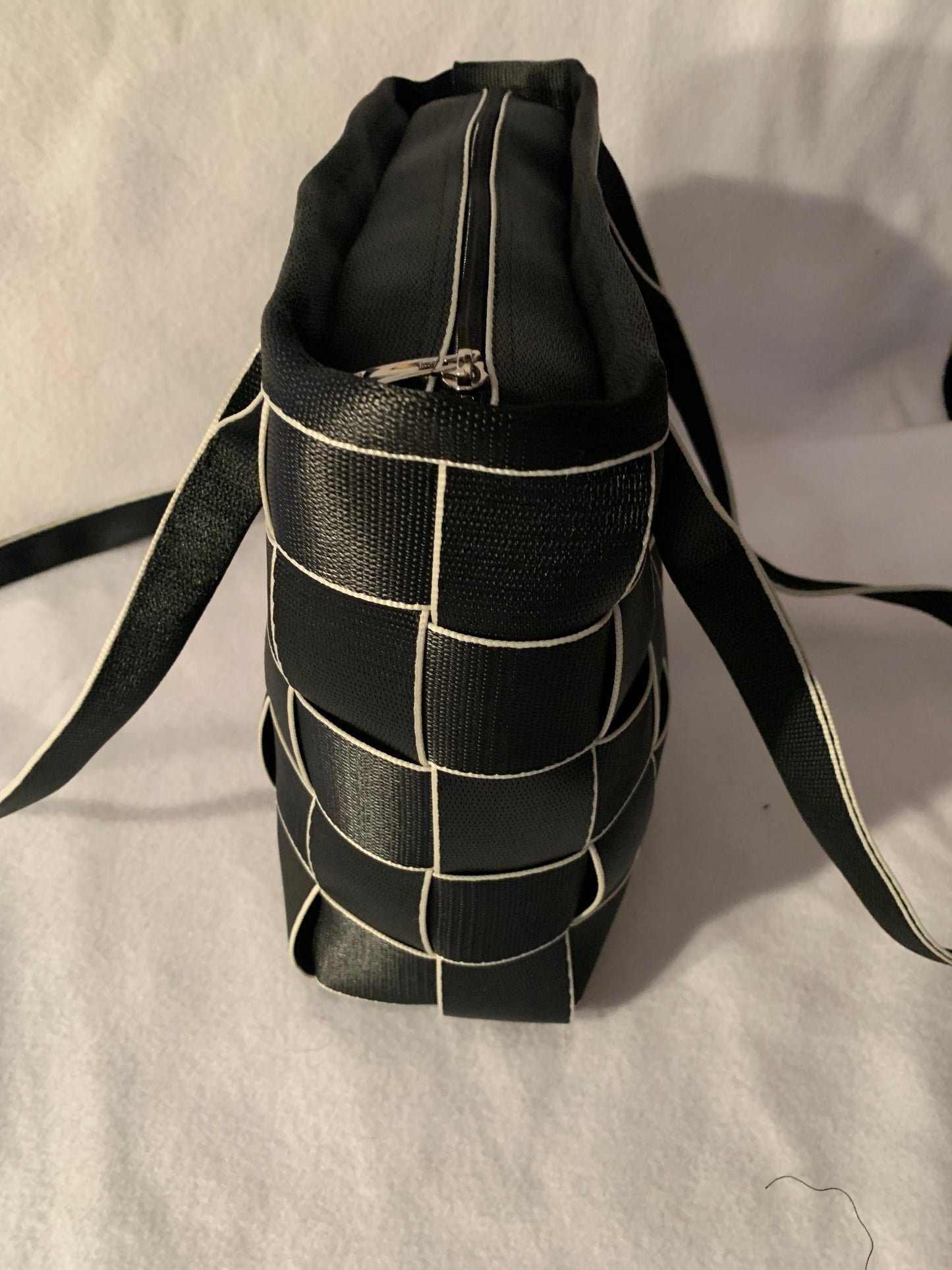 Seat Belt Purse in black with white edges, zipper, washable, geometric lining, large satchel, shoulder straps