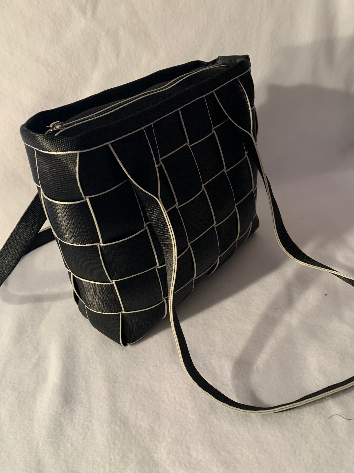 Seat Belt Purse in black with white edges, zipper, washable, geometric lining, large satchel, shoulder straps