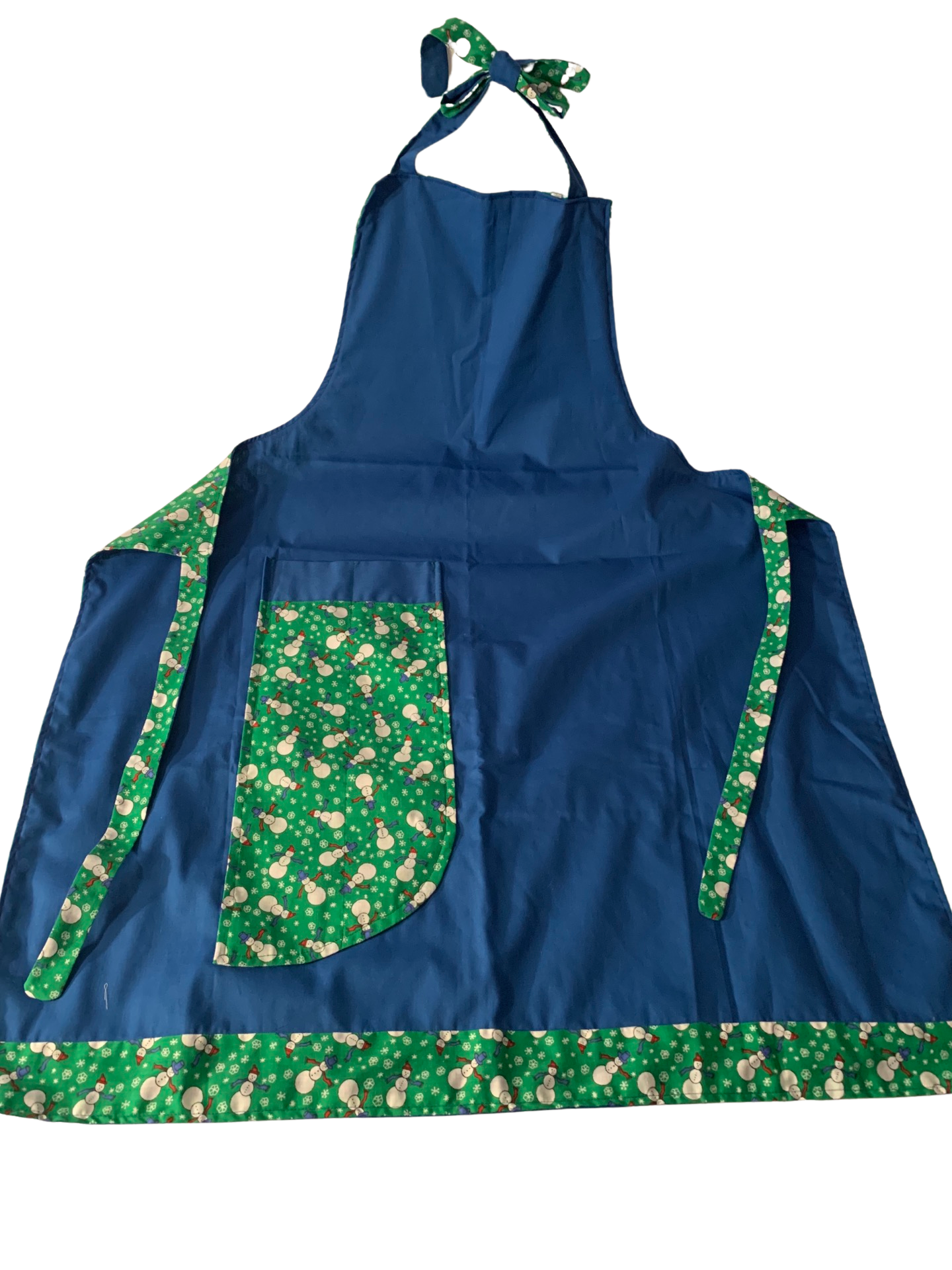 Adult Reversible Christmas Apron. Fun snowman print with blue on reverse side. Large pockets on both sides. Washable
