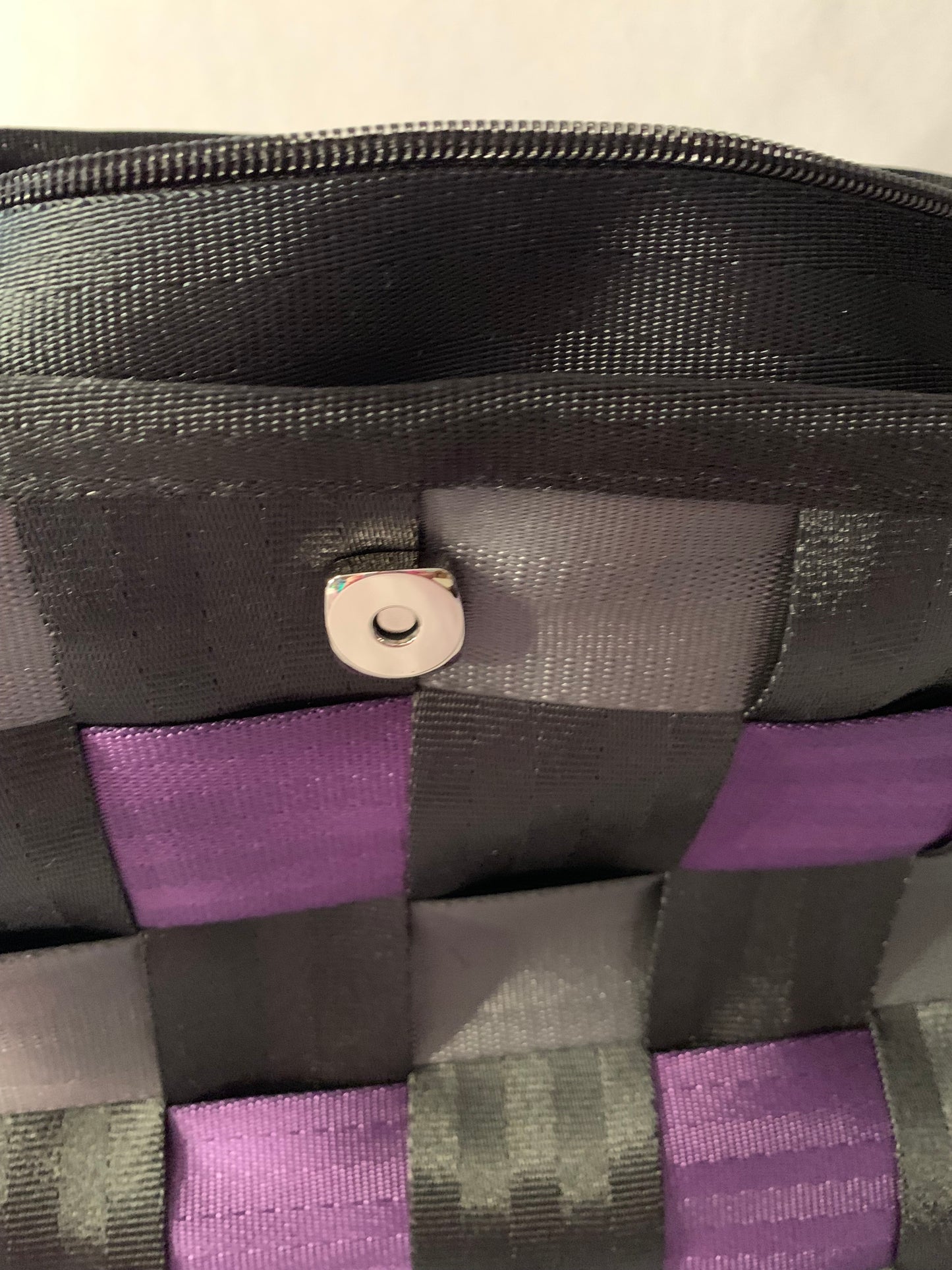 Cross Body Seat Belt Purse in black, grey and purple with zipper and magnetic snap flap, washable