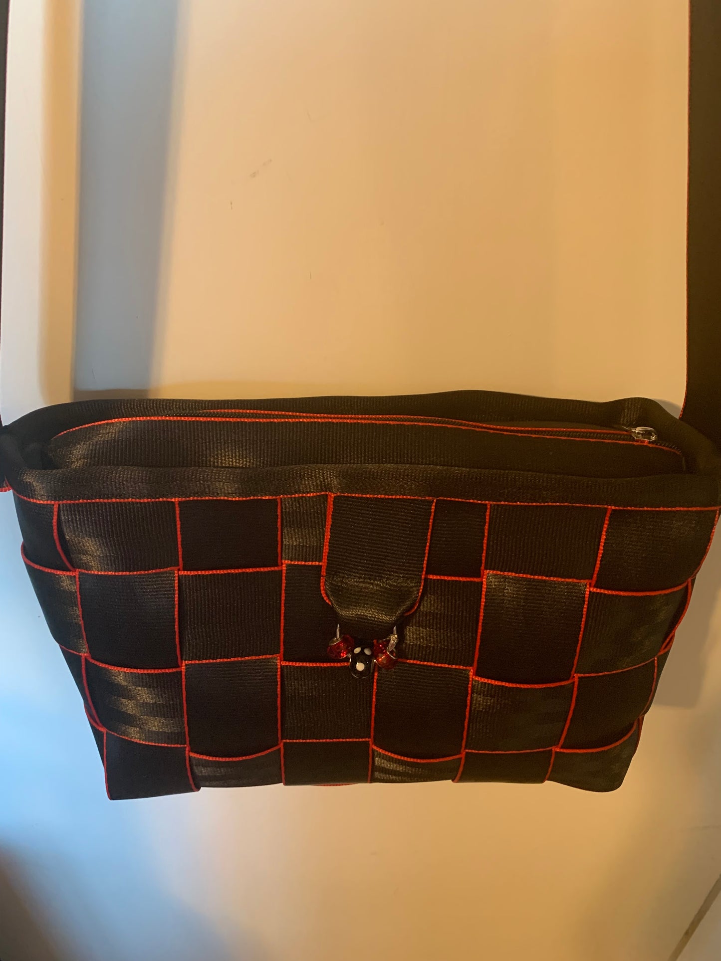 Cross Body Seat Belt Purse in black with red edges, zipper and flap, washable, various linins available