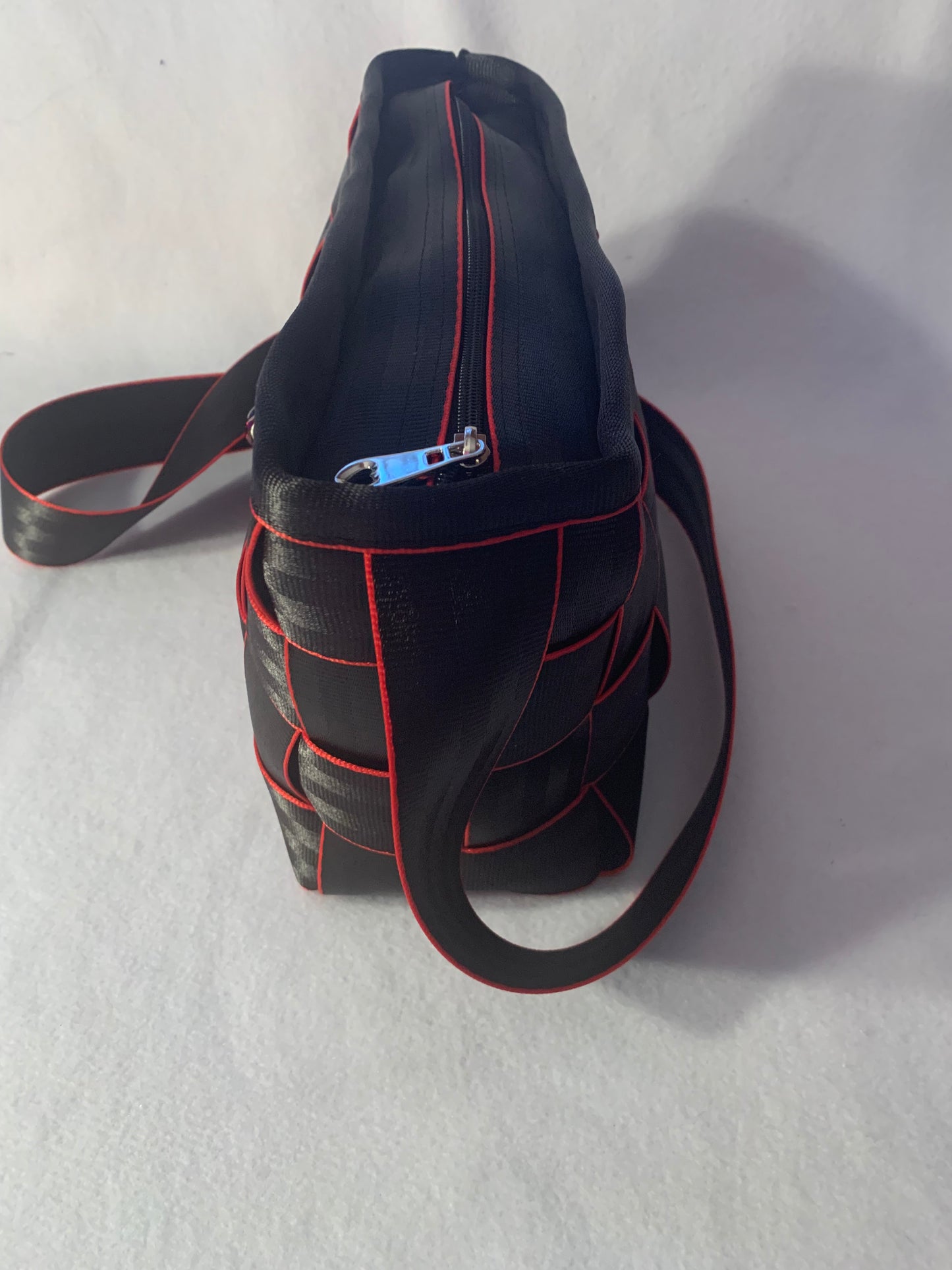 Cross Body Seat Belt Purse in black with red edges, zipper and flap, washable, various linins available